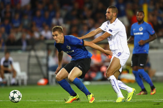 BRUGGE, BELGIUM - SEPTEMBER 14: Islam Slimani of Leicester City pushes Bjoern Engels of Club Brugge during the UEFA Champions League match between Club Brugge KV and Leicester City FC at Jan Breydel Stadium on September 14, 2016 in Brugge, Belgium. 