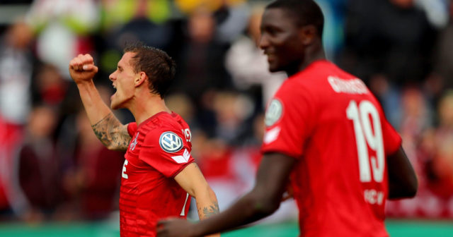 BREMERHAVEN, GERMANY - AUGUST 12: Simon Zoller (L) of Koeln celebrates after he scores the 5th goal during the DFB Cup first round match between Leher TS and 1. FC Koeln at Nordseestadion on August 12, 2017 in Bremerhaven, Germany. (Photo by Martin Rose/Bongarts/Getty Images)