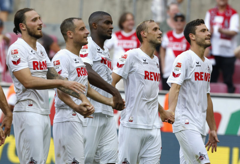 COLOGNE, GERMANY - AUGUST 27: LtoR Marco Hoeger, Matthias Lehmann, Anthony Modeste, Marcel Risse and Jonas Hector stand in front of supporters after the Bundesliga match between 1. FC Koeln and SV Darmstadt 98 at RheinEnergieStadion on August 27, 2016 in Cologne, Germany. (Photo by Juergen Schwarz/Bongarts/Getty Images)