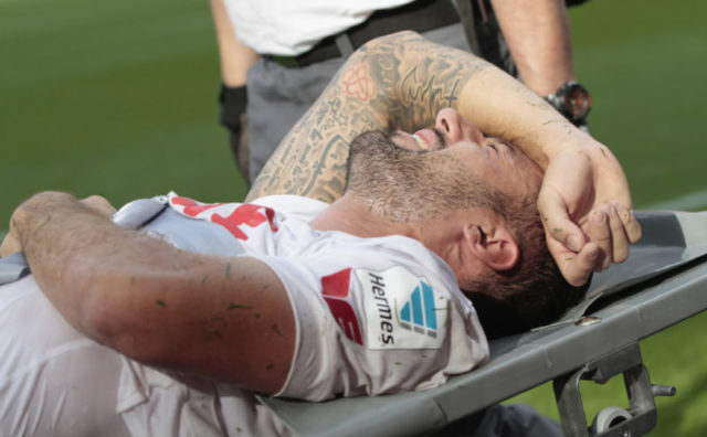 COLOGNE, GERMANY - AUGUST 27: Dominic Maroh of Cologne is carried off the field on a stretcher during the Bundesliga match between 1. FC Koeln and SV Darmstadt 98 at RheinEnergieStadion on August 27, 2016 in Cologne, Germany. (Photo by Juergen Schwarz/Bongarts/Getty Images)