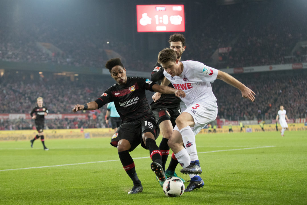 COLOGNE, GERMANY - DECEMBER 21: Wendell (L-R), Admir Mehmedi of Leverkusen and Dominique Heintz of Koeln fight for the ball during the Bundesliga match between 1. FC Koeln and Bayer 04 Leverkusen at RheinEnergieStadion on December 21, 2016 in Cologne, Germany.