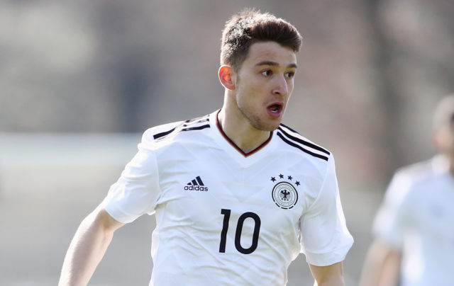 KELSTERBACH, GERMANY - MARCH 25: Salih Oezcan of Germany controles the ball during the UEFA Elite Round match between U19 Germany and U19 Serbia at Sportpark on March 25, 2017 in Kelsterbach, Germany.