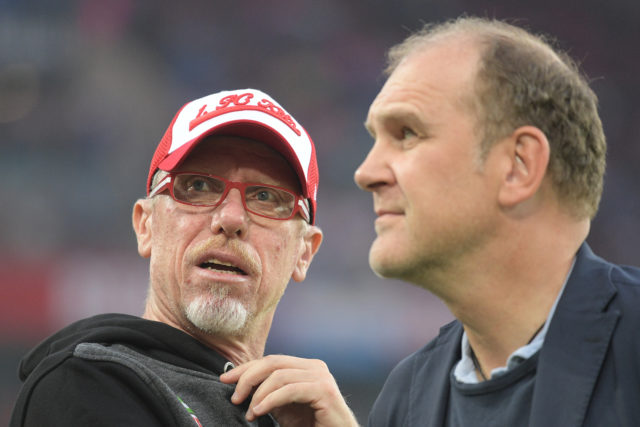 COLOGNE, GERMANY - AUGUST 25: Peter Stoeger, coach of Koeln, (l) and Joerg Schmadtke, sporting director of Koeln, ahead of the Bundesliga match between 1. FC Koeln and Hamburger SV at RheinEnergieStadion on August 25, 2017 in Cologne, Germany. (Photo by Lukas Schulze/Bongarts/Getty Images)