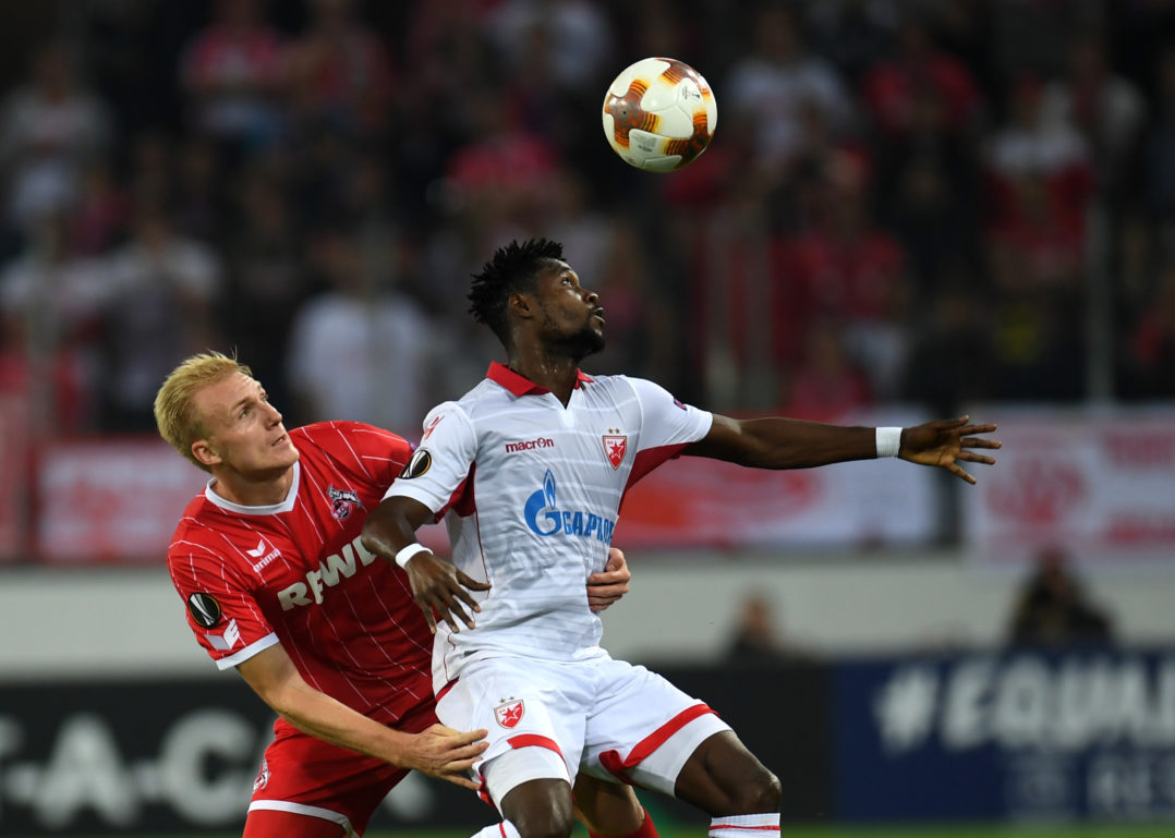 Cologne's Danish defender Frederik Soerensen and Belgrade´s Ghanean forward Richmond Boakye vie for the ball during the UEFA Europa League group H football match between FC Cologne and FC Crvena Zvezda Beograd in Cologne, western Germany, on September 28, 2017. / AFP PHOTO / PATRIK STOLLARZ (Photo credit should read PATRIK STOLLARZ/AFP/Getty Images)