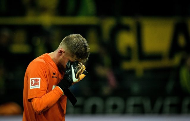 Cologne's German goalkeeper Timo Horn reacts after the German first division Bundesliga football match Borussia Dortmund v FC Cologne, in Dortmund, western Germany, on September 17, 2017. / AFP PHOTO / SASCHA SCHUERMANN / RESTRICTIONS: DURING MATCH TIME: DFL RULES TO LIMIT THE ONLINE USAGE TO 15 PICTURES PER MATCH AND FORBID IMAGE SEQUENCES TO SIMULATE VIDEO. == RESTRICTED TO EDITORIAL USE == FOR FURTHER QUERIES PLEASE CONTACT DFL DIRECTLY AT + 49 69 650050 (Photo credit should read SASCHA SCHUERMANN/AFP/Getty Images)