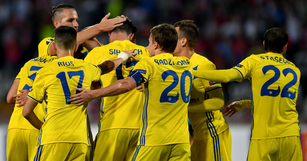 Bate's forward Nikolai Signevich celebrates with teammates after scoring a goal during the UEFA Europa League match between FK Crvena Zvezda Beograd and Bate Borisov at the Rajko Mitic stadium in Belgrade on September 14, 2017. / AFP PHOTO / ANDREJ ISAKOVIC (Photo credit should read ANDREJ ISAKOVIC/AFP/Getty Images)