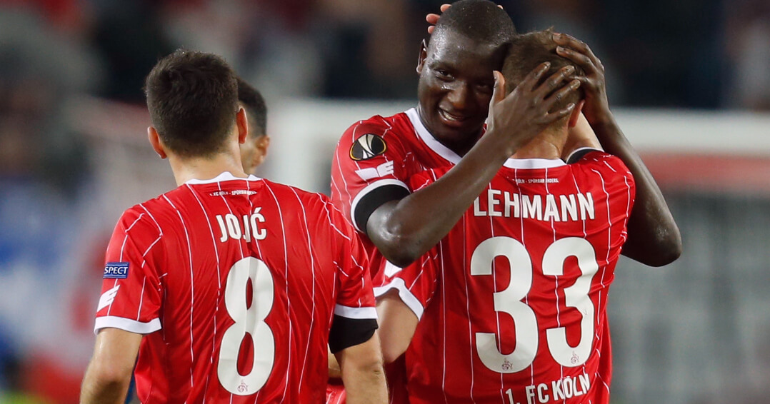 Cologne's Serbian midfielder Milos Jojic, Cologne's French forward Sehrou Guirassy and Cologne's German midfielder Matthias Lehmann (L-R) celebrate after the UEFA Europa League football match 1 FC Cologne v Arsenal FC on November 23, 2017 in Cologne, western Germany. / AFP PHOTO / INA FASSBENDER (Photo credit should read INA FASSBENDER/AFP/Getty Images)