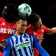 Berlin's German forward Davie Selke (C) Cologne's German midfielder Salih Ozcan (R) and Cologne's French forward Sehrou Guirassy vie for the ball during the German Cup (DFB Pokal) football match Hertha Berlin v 1 FC Cologne at the Olympic stadium in Berlin on October 25, 2017. / AFP PHOTO / John MACDOUGALL / RESTRICTIONS: ACCORDING TO DFB RULES IMAGE SEQUENCES TO SIMULATE VIDEO IS NOT ALLOWED DURING MATCH TIME. MOBILE (MMS) USE IS NOT ALLOWED DURING AND FOR FURTHER TWO HOURS AFTER THE MATCH. == RESTRICTED TO EDITORIAL USE == FOR MORE INFORMATION CONTACT DFB DIRECTLY AT +49 69 67880 / (Photo credit should read JOHN MACDOUGALL/AFP/Getty Images)