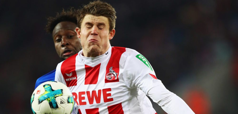 COLOGNE, GERMANY - DECEMBER 16: Dominique Heintz of FC Koeln battles for the ball with Divock Origi of Wolfsburg during the Bundesliga match between 1. FC Koeln and VfL Wolfsburg at RheinEnergieStadion on December 16, 2017 in Cologne, Germany. (Photo by Dean Mouhtaropoulos/Bongarts/Getty Images)