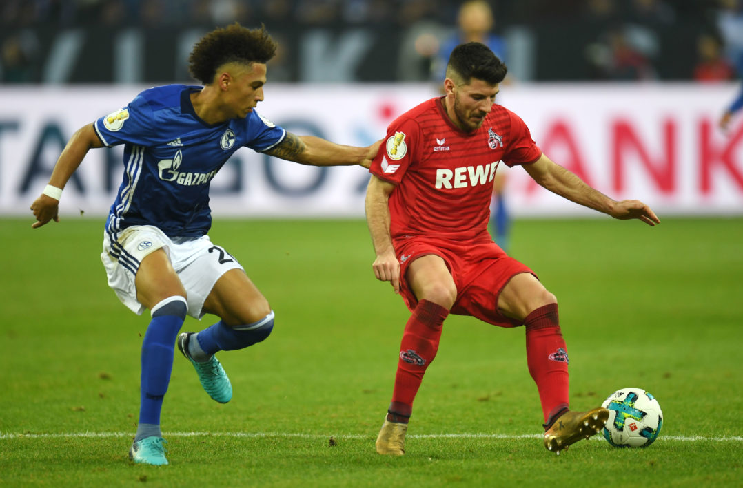 Cologne's Serbian midfielder Milos Jojic (L) and Schalke's German defender Thilo Kehrer vie for the ball during the German football Cup DFB Pokal round of sixteen match FC Schalke 04 vs FC Cologne in Gelsenkirchen, western Germany, on December 19, 2017. / AFP PHOTO / Patrik STOLLARZ / RESTRICTIONS: ACCORDING TO DFB RULES IMAGE SEQUENCES TO SIMULATE VIDEO IS NOT ALLOWED DURING MATCH TIME. MOBILE (MMS) USE IS NOT ALLOWED DURING AND FOR FURTHER TWO HOURS AFTER THE MATCH. == RESTRICTED TO EDITORIAL USE == FOR MORE INFORMATION CONTACT DFB DIRECTLY AT +49 69 67880 / (Photo credit should read PATRIK STOLLARZ/AFP/Getty Images)