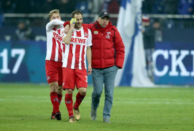 GELSENKIRCHEN, GERMANY - DECEMBER 02: (L-R) Matthias Lehmann and head coach Peter Stoeger of Koeln ealk off the opitch after the 2-2 draw of the Bundesliga match between FC Schalke 04 and 1. FC Koeln at Veltins-Arena on December 2, 2017 in Gelsenkirchen, Germany.