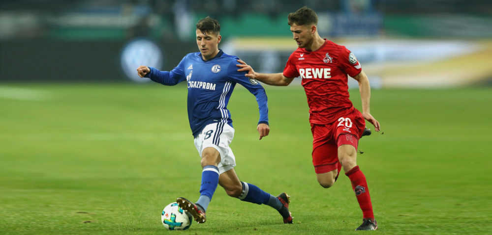 GELSENKIRCHEN, GERMANY - DECEMBER 19: Alessandro Schoepf (L) of Schalke battles for the ball with Salih Oezcan of Koeln during the DFB Cup match between FC Schalke 04 and 1.FC Koeln at Veltins-Arena on December 19, 2017 in Gelsenkirchen, Germany. (Photo by Lars Baron/Bongarts/Getty Images)