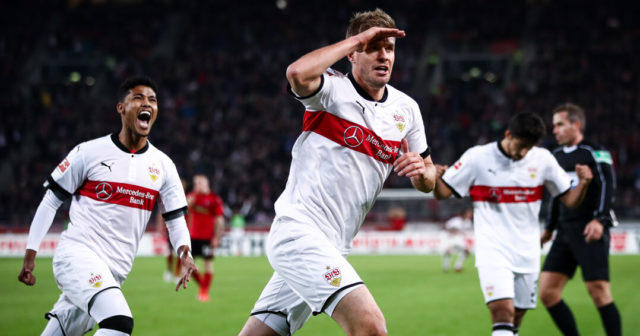 STUTTGART, GERMANY - OCTOBER 29: Simon Terodde of Stuttgart #9 celebrates with his team-mates after scoring his team's third goal to make it 3-0 during the Bundesliga match between VfB Stuttgart and Sport-Club Freiburg at Mercedes-Benz Arena on October 29, 2017 in Stuttgart, Germany. (Photo by Alex Grimm/Bongarts/Getty Images)