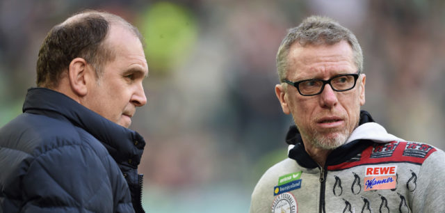 WOLFSBURG, GERMANY - JANUARY 31: Peter Stoeger head coach of Cologne (R) in discussion with Joerg Schmadtke athletic director of Colonge prior to the Bundesliga match between VfL Wolfsburg and 1. FC Koeln at Volkswagen Arena on January 31, 2016 in Wolfsburg, Germany. (Photo by Stuart Franklin/Bongarts/Getty Images)