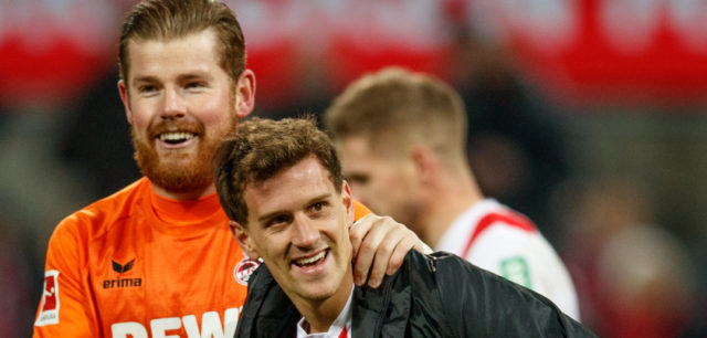 COLOGNE, GERMANY - JANUARY 14: Timo Horn of Koeln celebrates with Simon Zoller of Koeln after winning the Bundesliga match between 1. FC Koeln and Borussia Moenchengladbach at RheinEnergieStadion on January 14, 2018 in Cologne, Germany. (Photo by Lars Baron/Bongarts/Getty Images