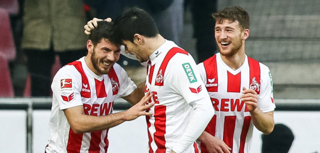 COLOGNE, GERMANY - JANUARY 27: Milos Jojic #8 of 1.FC Koeln celebrates with his team-mates after scoring his teams first goal to make it 1-0 during the Bundesliga match between 1. FC Koeln and FC Augsburg at RheinEnergieStadion on January 27, 2018 in Cologne, Germany. (Photo by Maja Hitij/Bongarts/Getty Images)