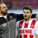 COLOGNE, GERMANY - JANUARY 27: Stefan Ruthenbeck Head Coach of 1. FC Koeln and Milos Jojic #8 of 1.FC Koeln react after the Bundesliga match between 1. FC Koeln and FC Augsburg at RheinEnergieStadion on January 27, 2018 in Cologne, Germany. (Photo by Maja Hitij/Bongarts/Getty Images)