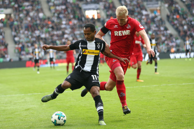 MOENCHENGLADBACH, GERMANY - AUGUST 20: Raffael of Moenchengladbach (l) and Frederik Sorensen of Koeln during the Bundesliga match between Borussia Moenchengladbach and 1. FC Koeln at Borussia-Park on August 20, 2017 in Moenchengladbach, Germany. (Photo by Christof Koepsel/Bongarts/Getty Images)