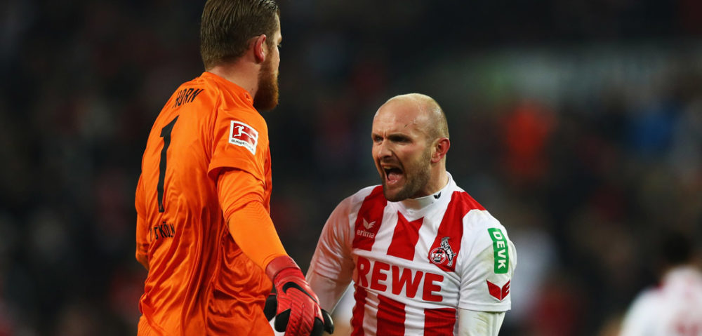 COLOGNE, GERMANY - JANUARY 14: Goalkeeper, Timo Horn and Konstantin Rausch of FC Koeln celebrate victory after the Bundesliga match between 1. FC Koeln and Borussia Moenchengladbach at RheinEnergieStadion on January 14, 2018 in Cologne, Germany. (Photo by Dean Mouhtaropoulos/Bongarts/Getty Images)