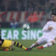 COLOGNE, GERMANY - FEBRUARY 02: Julian Weigl of Dortmund is challenged by Salih Ozcan of Cologne during the Bundesliga match between 1. FC Koeln and Borussia Dortmund at RheinEnergieStadion on February 2, 2018 in Cologne, Germany. (Photo by Alex Grimm/Bongarts/Getty Images)