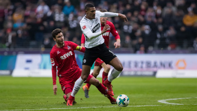 FRANKFURT AM MAIN, GERMANY - FEBRUARY 10: Sebastien Haller of Frankfurt is challenged by Jonas Hector of Koeln during the Bundesliga match between Eintracht Frankfurt and 1. FC Koeln at Commerzbank-Arena on February 10, 2018 in Frankfurt am Main, Germany. (Photo by Simon Hofmann/Bongarts/Getty Images)