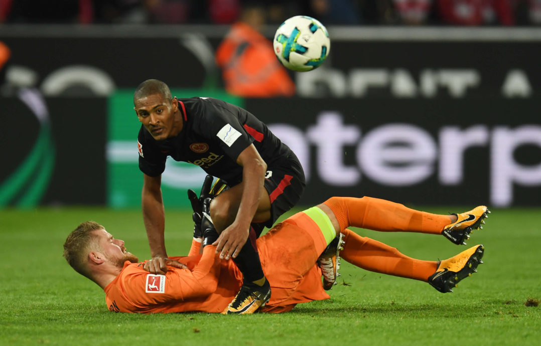 Cologne's goalkeeper Timo Horn and Frankfurt´s midfielder Sebastian Haller vie for the ball during the German First division Bundesliga football match 1.FC Cologne vs Eintracht Frankfurt in Cologne, western Germany, on September 20, 2017. / AFP PHOTO / PATRIK STOLLARZ (Photo credit should read PATRIK STOLLARZ/AFP/Getty Images)