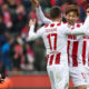 COLOGNE, GERMANY - MARCH 18: Yuya Osako #13 of 1.FC Koeln and Christian Clemens #17 of 1.FC Koeln celebrate after the Bundesliga match between 1. FC Koeln and Bayer 04 Leverkusen at RheinEnergieStadion on March 18, 2018 in Cologne, Germany. (Photo by Maja Hitij/Bongarts/Getty Images)