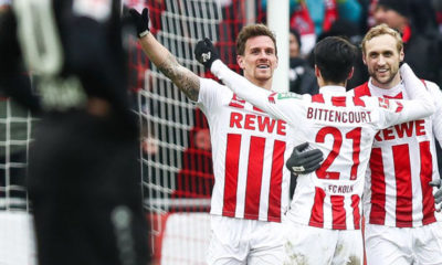 COLOGNE, GERMANY - MARCH 18: Simon Zoller #11 of 1.FC Koeln celebrates with Leonardo Bittencourt #21 of 1.FC Koeln and Marcel Risse #7 of 1.FC Koeln after scoring his teams second goal during the Bundesliga match between 1. FC Koeln and Bayer 04 Leverkusen at RheinEnergieStadion on March 18, 2018 in Cologne, Germany. (Photo by Maja Hitij/Bongarts/Getty Images)