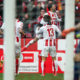 COLOGNE, GERMANY - MARCH 18: Yuya Osako #13 of 1.FC Koeln celebrates with Leonardo Bittencourt #21 of 1.FC Koeln and team-mates after scoring his teams first goal during the Bundesliga match between 1. FC Koeln and Bayer 04 Leverkusen at RheinEnergieStadion on March 18, 2018 in Cologne, Germany. (Photo by Maja Hitij/Bongarts/Getty Images)