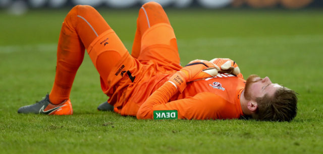 COLOGNE, GERMANY - MARCH 04: Timo Horn of Koeln lies dejected on the pitch after losing 2-3 the Bundesliga match between 1. FC Koeln and VfB Stuttgart at RheinEnergieStadion on March 4, 2018 in Cologne, Germany. (Photo by Christof Koepsel/Bongarts/Getty Images)