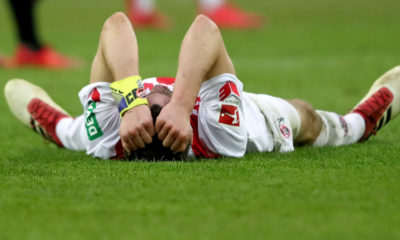 COLOGNE, GERMANY - MARCH 04: Jonas Hector of Koeln lies on the pitch after losing 2-3 the Bundesliga match between 1. FC Koeln and VfB Stuttgart at RheinEnergieStadion on March 4, 2018 in Cologne, Germany. (Photo by Christof Koepsel/Bongarts/Getty Images)