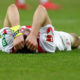 COLOGNE, GERMANY - MARCH 04: Jonas Hector of Koeln lies on the pitch after losing 2-3 the Bundesliga match between 1. FC Koeln and VfB Stuttgart at RheinEnergieStadion on March 4, 2018 in Cologne, Germany. (Photo by Christof Koepsel/Bongarts/Getty Images)