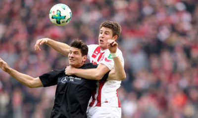 COLOGNE, GERMANY - MARCH 04: (L-R) Mario Gomez of Stuttgart and Frederik Soerensen of Koeln go up for a header during the Bundesliga match between 1. FC Koeln and VfB Stuttgart at RheinEnergieStadion on March 4, 2018 in Cologne, Germany. (Photo by Christof Koepsel/Bongarts/Getty Images)