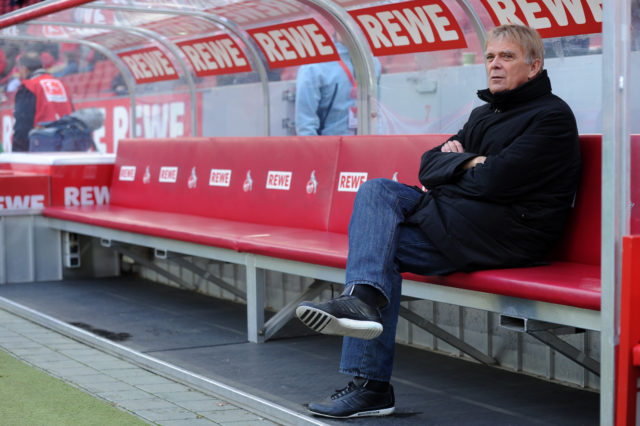 Sport director Volker Finke sits on the bench prior to the German first division Bundesliga football match 1.FC Cologne vs SC Freiburg in the German city of Cologne on December 10, 2011. AFP PHOTO / PATRIK STOLLARZ RESTRICTIONS / EMBARGO - DFL LIMITS THE USE OF IMAGES ON THE INTERNET TO 15 PICTURES (NO VIDEO-LIKE SEQUENCES) DURING THE MATCH AND PROHIBITS MOBILE (MMS) USE DURING AND FOR FURTHER TWO HOURS AFTER THE MATCH. FOR MORE INFORMATION CONTACT DFL. (Photo credit should read PATRIK STOLLARZ/AFP/Getty Images)