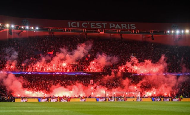 PARIS, FRANCE - MARCH 06: PSG fans light flares during the UEFA Champions League Round of 16 Second Leg match between Paris Saint-Germain and Real Madrid at Parc des Princes on March 6, 2018 in Paris, France. (Photo by Matthias Hangst/Bongarts/Getty Images)