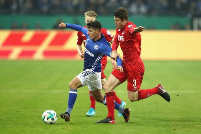 GELSENKIRCHEN, GERMANY - DECEMBER 19: Alessandro Schoepf (C) of Schalke battles for the ball with Dominique Heintz (R) of Koeln during the DFB Cup match between FC Schalke 04 and 1.FC Koeln at Veltins-Arena on December 19, 2017 in Gelsenkirchen, Germany. (Photo by Lars Baron/Bongarts/Getty Images)