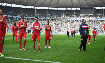 BERLIN, GERMANY - APRIL 14: Stefan Ruthenbeck, coach of Koeln, (2nd right) and players of Koeln applaud their supporters after the Bundesliga match between Hertha BSC and 1. FC Koeln at Olympiastadion on April 14, 2018 in Berlin, Germany. (Photo by Stuart Franklin/Bongarts/Getty Images)