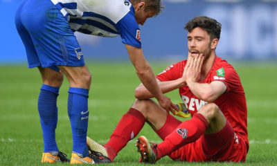 BERLIN, GERMANY - APRIL 14: Per Ciljan Skjelbred of Berlin (l) consoles Jonas Hector of Koeln after the Bundesliga match between Hertha BSC and 1. FC Koeln at Olympiastadion on April 14, 2018 in Berlin, Germany. (Photo by Stuart Franklin/Bongarts/Getty Images)