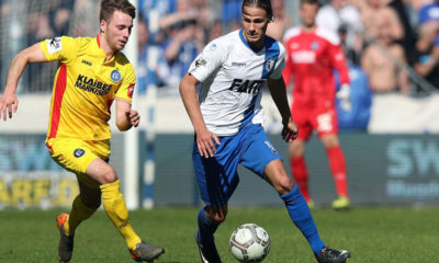 MAGDEBURG, GERMANY - APRIL 07: Matthias Bader (L) of Karlsruher SC and Tobias Schwede (R) of 1. FC Magdeburg compete during the 3. Liga match between 1. FC Magdeburg and Karlsruher SC at MDCC-Arena on April 7, 2018 in Magdeburg, Germany. (Photo by Ronny Hartmann/Bongarts/Getty Images)