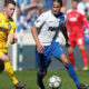 MAGDEBURG, GERMANY - APRIL 07: Matthias Bader (L) of Karlsruher SC and Tobias Schwede (R) of 1. FC Magdeburg compete during the 3. Liga match between 1. FC Magdeburg and Karlsruher SC at MDCC-Arena on April 7, 2018 in Magdeburg, Germany. (Photo by Ronny Hartmann/Bongarts/Getty Images)
