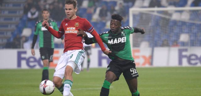 REGGIO NELL'EMILIA, ITALY - NOVEMBER 03: Claud Adjapong (R) of US Sassuolo Calcio competes with Louis Schaub of SK Rapid Wien during the UEFA Europa League match between US Sassuolo Calcio and SK Rapid Wien at Mapei Stadium - Citta' del Tricolore on November 3, 2016 in Reggio nell'Emilia, Italy . (Photo by Dino Panato/Getty Images)