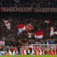 Cologne's players celebrate with their fans after the UEFA Europa League football match 1 FC Cologne v Arsenal FC on November 23, 2017 in Cologne, western Germany. / AFP PHOTO / INA FASSBENDER (Photo credit should read INA FASSBENDER/AFP/Getty Images)