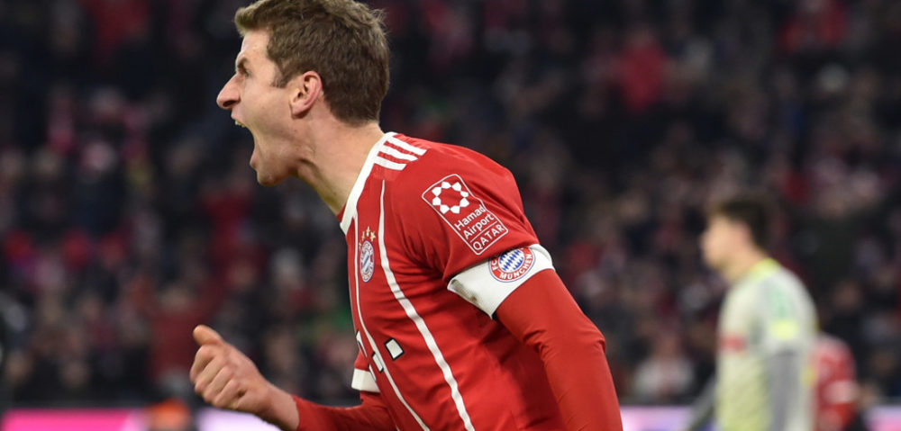 Bayern Munich's striker Thomas Mueller celebrates after the first goal during the German first division Bundesliga football match between FC Bayern Munich and FC Cologne on December 13, 2017 in Munich. / AFP PHOTO / Christof STACHE / RESTRICTIONS: DURING MATCH TIME: DFL RULES TO LIMIT THE ONLINE USAGE TO 15 PICTURES PER MATCH AND FORBID IMAGE SEQUENCES TO SIMULATE VIDEO. == RESTRICTED TO EDITORIAL USE == FOR FURTHER QUERIES PLEASE CONTACT DFL DIRECTLY AT + 49 69 650050 (Photo credit should read CHRISTOF STACHE/AFP/Getty Images)
