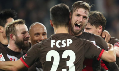 HAMBURG, GERMANY - DECEMBER 18: Lasse Sobiech (R) of Pauli celebrate after his first goal during the Second Bundesliga match between FC St. Pauli and VfL Bochum 1848 at Millerntor Stadium on December 18, 2017 in Hamburg, Germany. (Photo by Oliver Hardt/Bongarts/Getty Images)