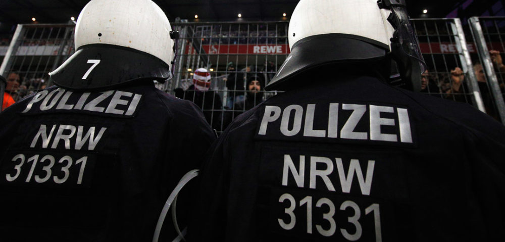 COLOGNE, GERMANY - JANUARY 14: Police or Polizei watch the fans of Borussia Monchengladbach during the Bundesliga match between 1. FC Koeln and Borussia Moenchengladbach at RheinEnergieStadion on January 14, 2018 in Cologne, Germany. (Photo by Dean Mouhtaropoulos/Bongarts/Getty Images)