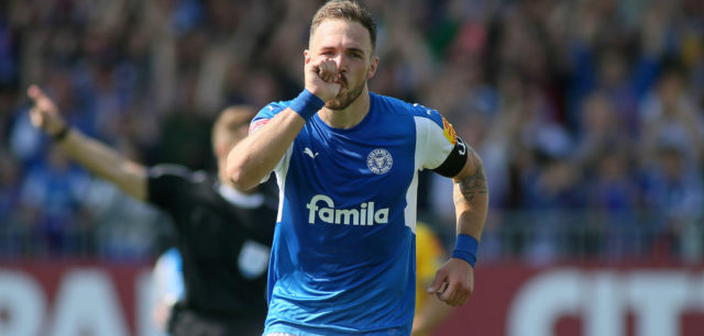 KIEL, GERMANY - MAY 13: Rafael Czichos of Holstein Kiel celebrate their teams fourth goal scoring during the Second Bundesliga match between Holstein Kiel and Eintracht Braunschweig at Holstein-Stadion on May 13, 2018 in Kiel, Germany. (Photo by Selim Sudheimer/Bongarts/Getty Images)