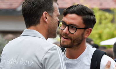 EPPAN, ITALY - MAY 23: (L-R) Team manager Oliver Bierhoff greets Jonas Hector as he arrives on day one of the Germany National Football team's training camp at Hotel Weinegg on May 23, 2018 in Eppan, Italy. (Photo by Markus Gilliar/DFB - Pool/Getty Images)