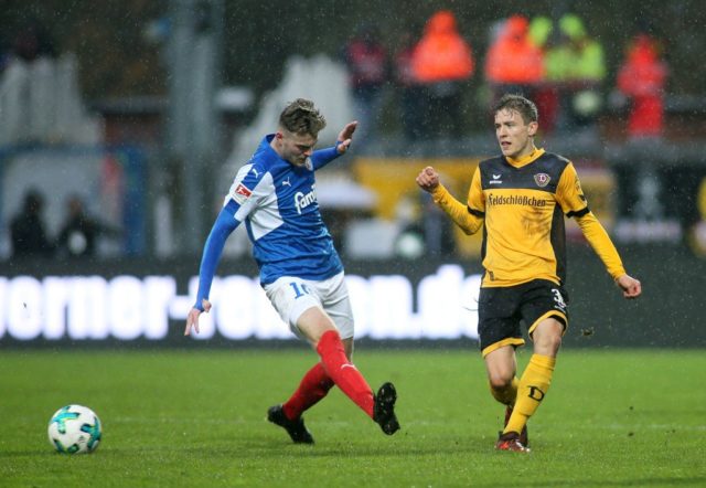 KIEL, GERMANY - NOVEMBER 05: Marvin Ducksch of Holstein Kiel (L) fights for the ball with Niklas Hauptmann of Holstein Kiel during the Second Bundesliga match between Holstein Kiel and SG Dynamo Dresden at Holstein-Stadion on November 5, 2017 in Kiel, Germany. (Photo by Selim Sudheimer/Bongarts/Getty Images)