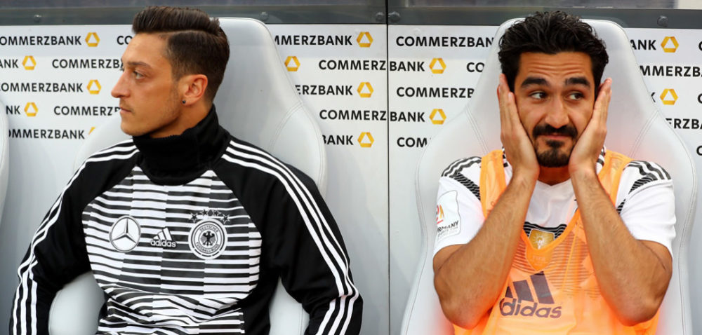 LEVERKUSEN, GERMANY - JUNE 08: Mesut Oezil (L) of Germany and team mate Ilkay Guendogan sitting on the bench during the International Friendly match between Germany and Saudi Arabia at BayArena on June 8, 2018 in Leverkusen, Germany. (Photo by Martin Rose/Bongarts/Getty Images)