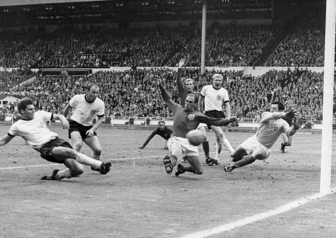 West Germany's Wolfgang Weber pokes the ball past England's diving goalkeeper, Gordon Banks, for an equaliser in the last minute of normal time in the World Cup Final at Wembley. England went on to win the 1966 World Cup 4-2 after extra time. (Photo by Keystone/Getty Images)